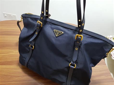 prada baguette bag blue|prada nylon shoulder bag price.